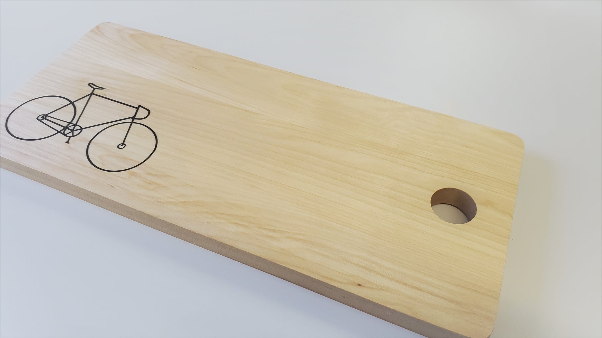 Bicycle maple cutting board