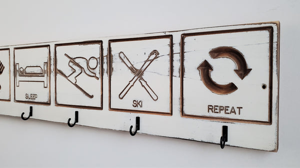 Ski logo hook rack eat-sleep-ski-repeat